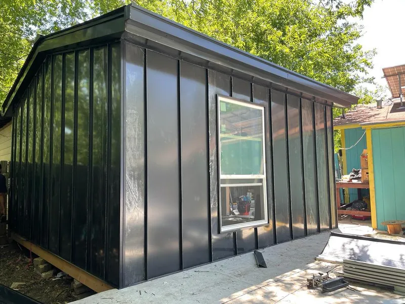 Black standing seam metal wall panels for Metal Roof Installation in Dunn