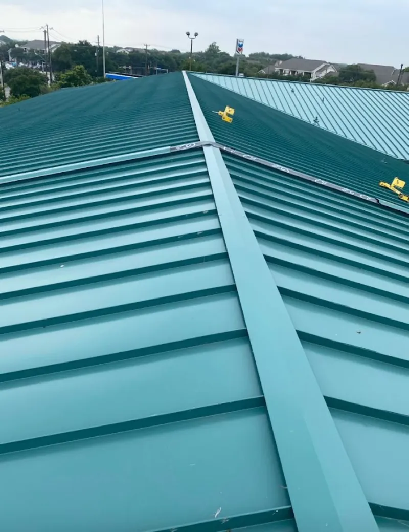 Green commercial metal roof ridge and valley for Metal Roof Repair in Dunn