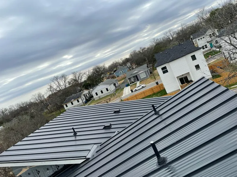 Standing seam metal roof panels with vents for Skylight Repair in Dunn